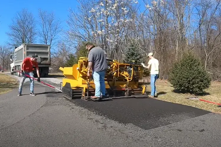 leeboy-paving-machine-leveling-150-tons-of-recycled-asphalt-millings-1500-foot-long-driveway